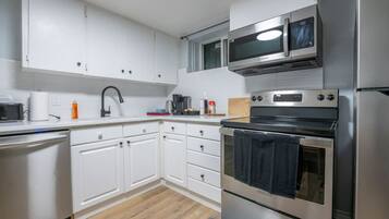 Fridge, microwave, dishwasher, coffee/tea maker