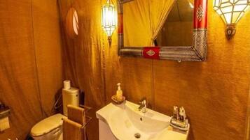Shower, hydromassage showerhead, designer toiletries, towels