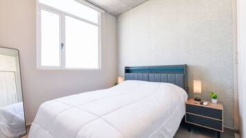 2 dormitorios, tabla de planchar con plancha, wifi y ropa de cama