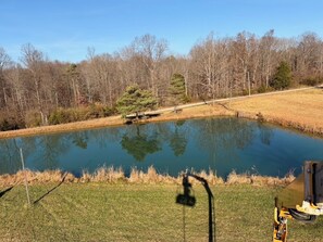 Property grounds - 4-bedroom farmhouse on 32 acres of private land with fishing pond and creek. (Freetown)