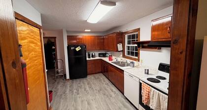 4-bedroom farmhouse on 32 acres of private land with fishing pond and creek.