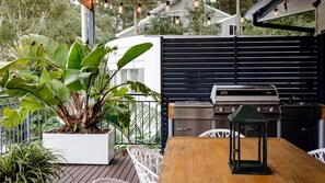 Outdoor dining - The Jungle Cubby Suite where the Wild meets Luxury (Terrigal)