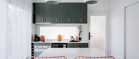 Microwave, stovetop, coffee/tea maker, toaster