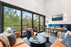 Living area - Private Modern Cabin: Hot Tub, 2 Firepits, King Bed, Bocce Court, Outdoor Movies (Sevierville)