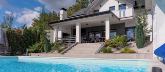 Modern villa with indoor and outdoor pool, sauna and scenic views