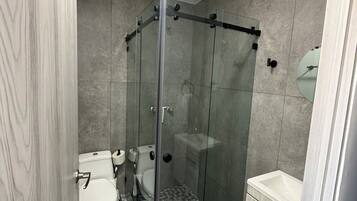 Classic Apartment, City View | Bathroom | Shower, towels, toilet paper