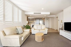 Living area - Luxury 1BR Near Stadium • Parking & Balcony (East Brisbane)