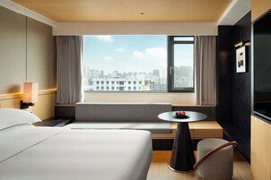 Comfort Condo, Multiple Beds, City View | Laptop workspace, free WiFi