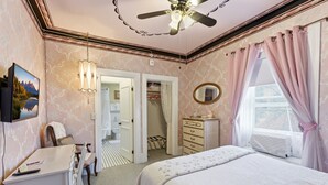 A bedroom with a bed, dresser, vanity, and a ceiling fan. - Comfortable Victorian style 1-br in Boutique B&B. (Heber City)