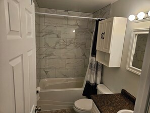 Hair dryer, towels, soap, toilet paper
