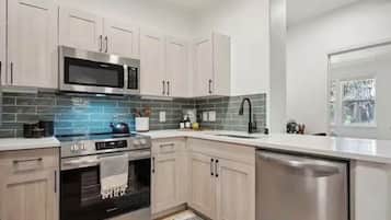 Coffee/tea maker, fridge, microwave, oven