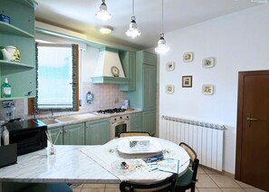 Fridge, microwave, oven, dishwasher - Casa Carminelli with veranda, garden and barbecue in Porto Azzurro (Porto Azzurro)