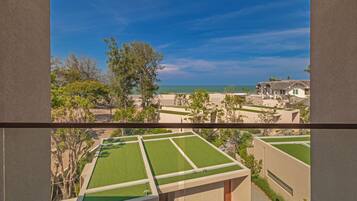 Garden Ocean View | Minibar, in-room safe, blackout curtains, free WiFi