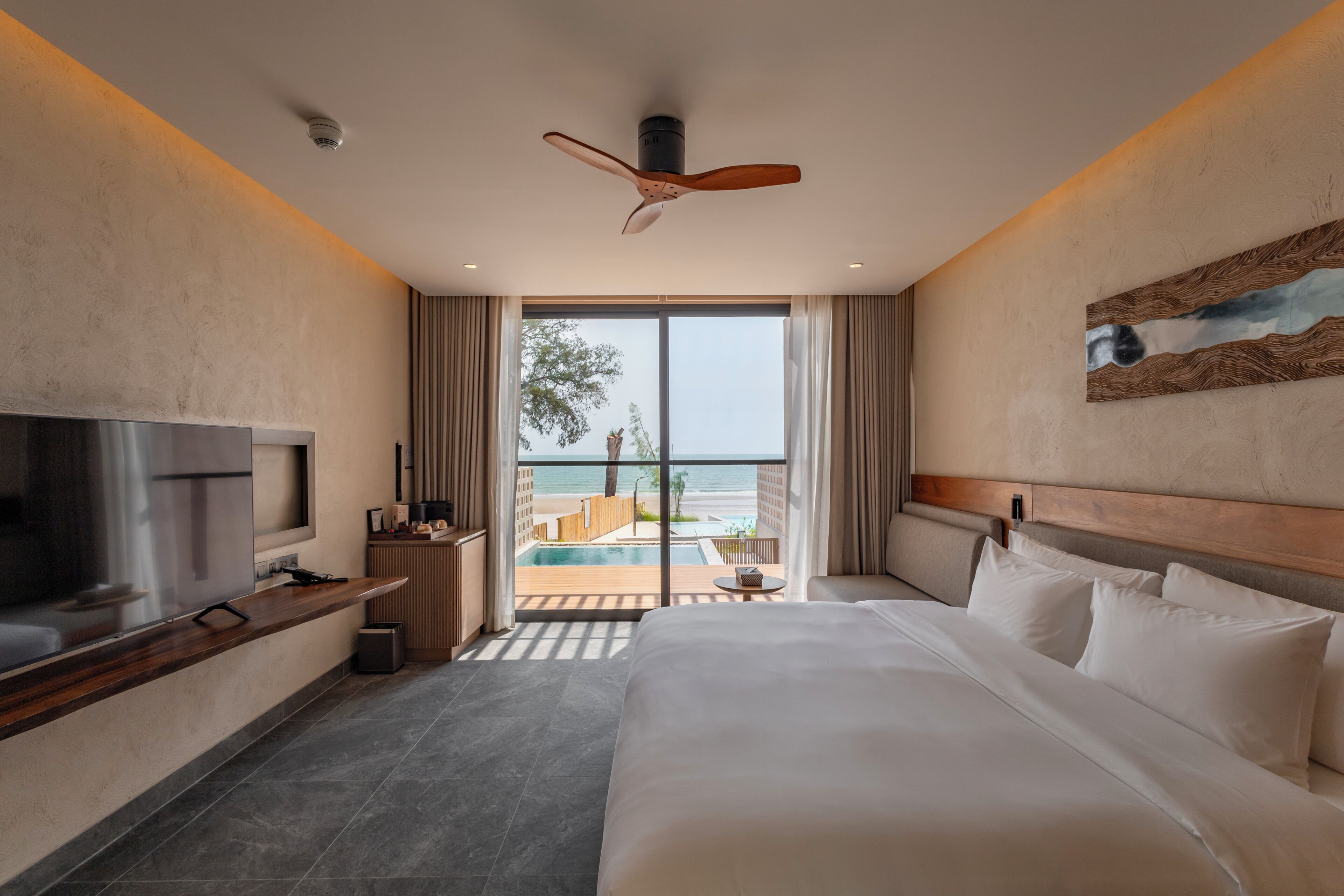 Beachfront Pool Villa Suite | Minibar, in-room safe, blackout drapes, free WiFi