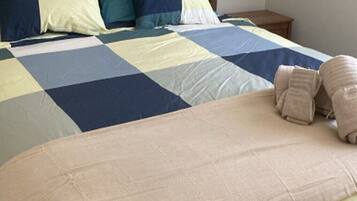 3 habitaciones y ropa de cama