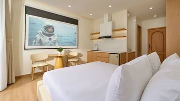 Standard Room, Balcony, City View | Minibar, desk, laptop workspace, blackout curtains