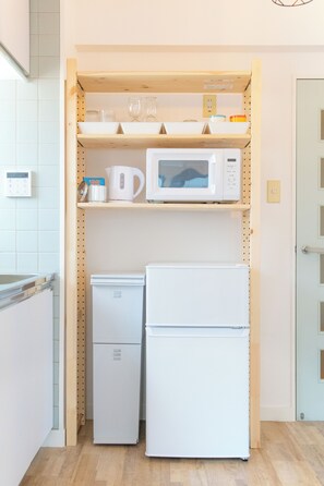 Apartamento | Cozinha privada | Geladeira grande, micro-ondas, cooktop