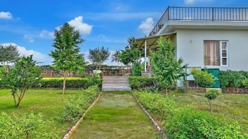 Deluxe Villa, Balcony, Garden View | Property grounds