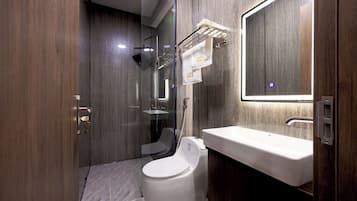 Shower, free toiletries, hair dryer, slippers