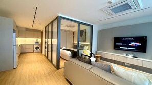 Living room - Luxurious One Bedroom Condo With Pool View at Boat Avenue Near Laguna Phuket (Choeng Thale)