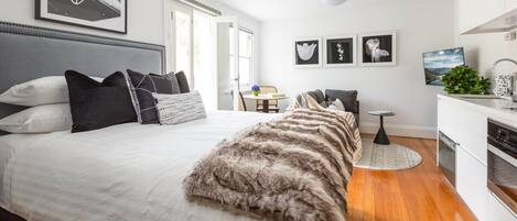 1 bedroom, desk, iron/ironing board, bed sheets