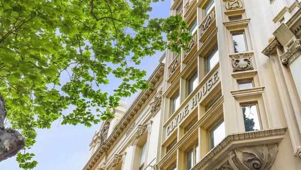 A historic building with ornate architectural details and the name 'CLYDE HOUSE' visible on the facade. - Inner-City Studio – Walk to Everything! (Melbourne)
