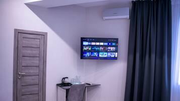 Quarto duplo, vista para a cidade | Parte interna