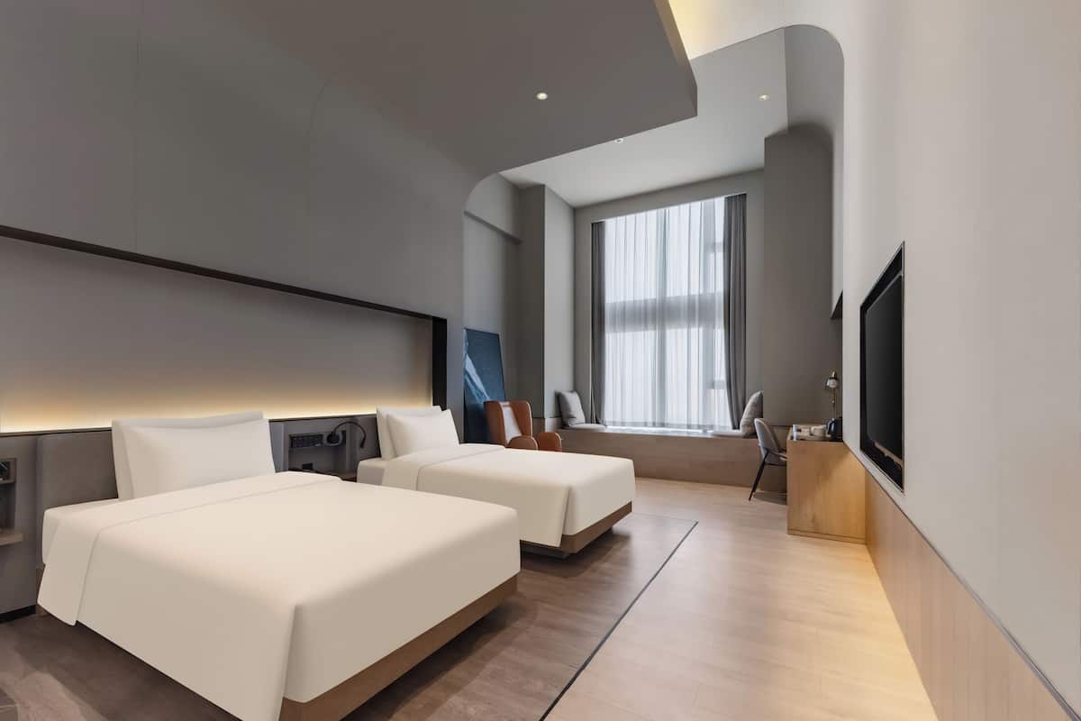 Business Twin kamer, niet-roken | Een gratis minibar, een bureau, een laptopwerkplek, gratis wifi
