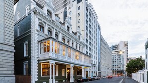 A historic building with a prominent entrance, large windows, and a balcony. - The Cape Town Club (Cape Town)