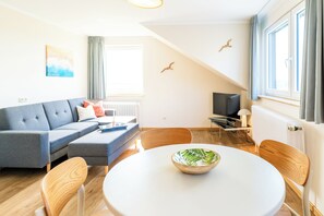 Living area - Beautiful vacation apartment with a view of the Burger Binnensee (Fehmarn)