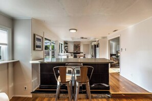 Fridge, microwave, oven, stovetop - Spacious 4-Bedrooms House with AC Near Domain & Q2, Sleeps 10, Patio + BBQ (Austin)