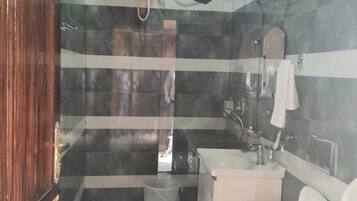 Double Room, Lake View | Bathroom | Slippers, towels, soap, shampoo