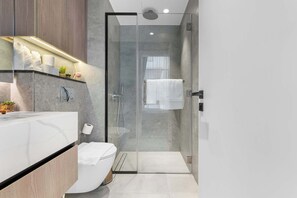 Shower, hair dryer, towels, shampoo - Modern 1BR Escape w Balcony Views and Community Lifestyle (Arjan)