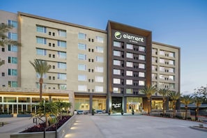 A hotel with a modern facade, multiple floors, and a prominent logo. - Element by Marriott San Diego Mission Valley (San Diego)