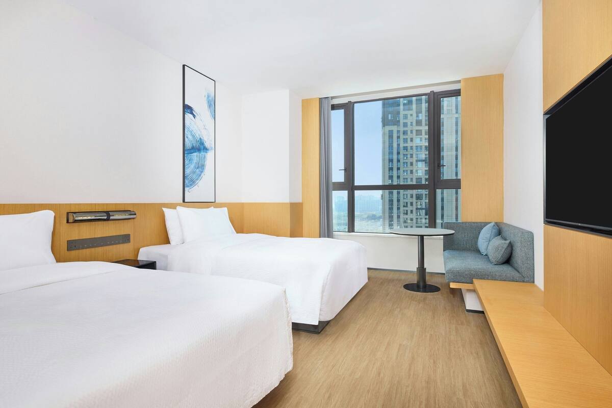Premium Room, 2 Double Beds, Partial Sea View | Down comforters, in-room safe, blackout drapes, WiFi (free)