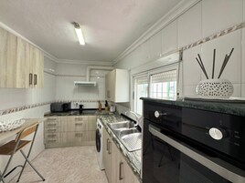 Apartamento Confort, vistas a la ciudad | Cocina privada