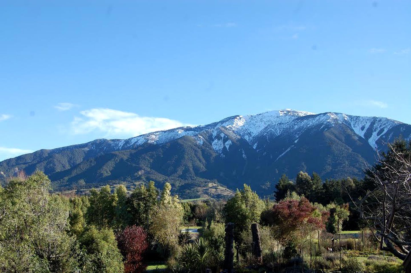 A mountain landscape with a clear sky.