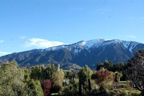 A mountain landscape with a clear sky.
