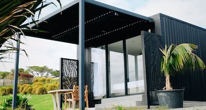 North Island Glamping Retreat for a Surfing Holiday near Auckland
