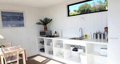 North Island Glamping Retreat for a Surfing Holiday near Auckland