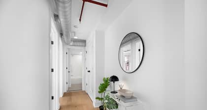 A rare find: sun-drenched 2BR corner suite in an 1860 furniture factory turned Art Deco landmark. Bold art, King Street views, boutique-hotel design. Chef's kitchen, in-unit laundry. Steps to Old Town's waterfront. Dogs welcome.
