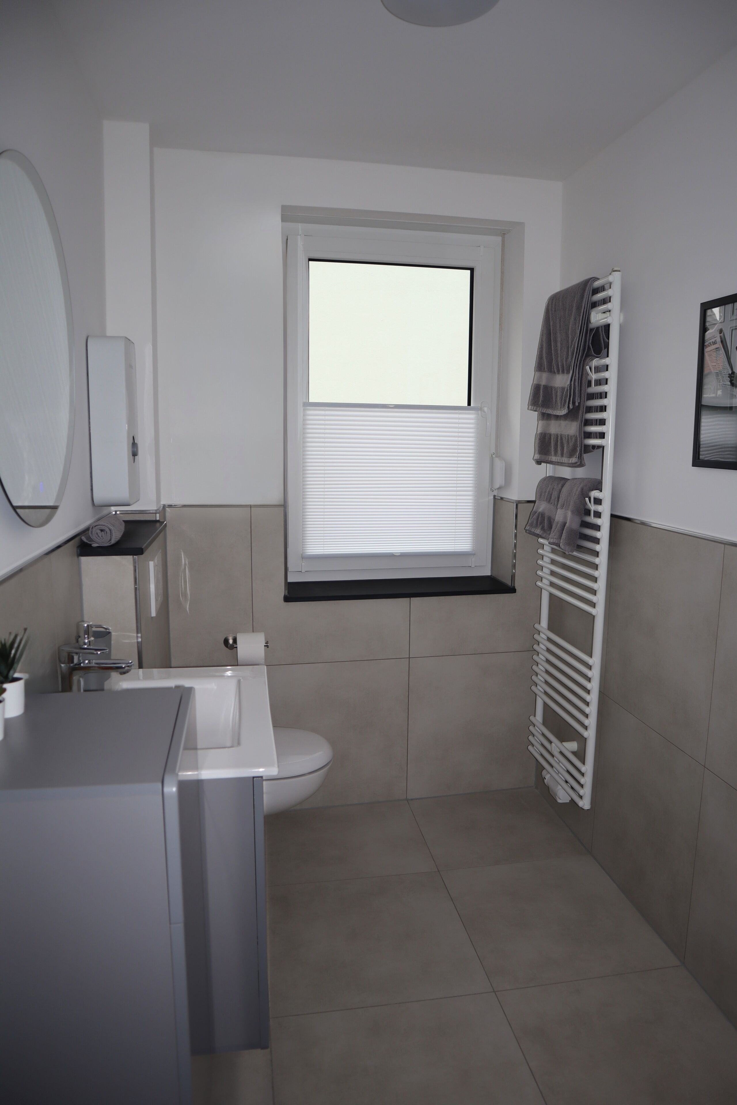 Shower, hair dryer, towels, toilet paper