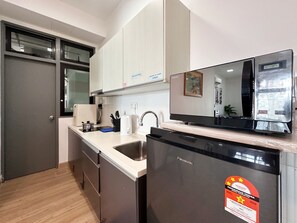 Apartamento urbano, vista para o oceano | Cozinha privada