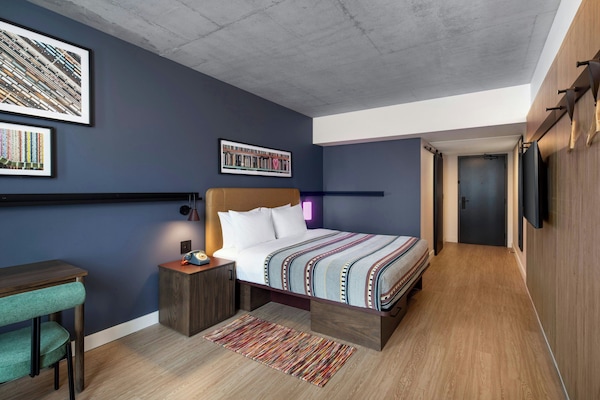 Room, 1 King Bed | Hypo-allergenic bedding available, minibar, in-room safe, WiFi (free)