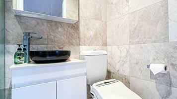 Shower, hair dryer, towels, soap