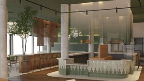 A modern interior with a bar area, seating, and a large window. - ibis Styles Zumaia Zestoa (Zestoa)