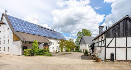Holiday Home 'Kutschenhaus' with Shared Terrace, Shared Garden and Wi-Fi