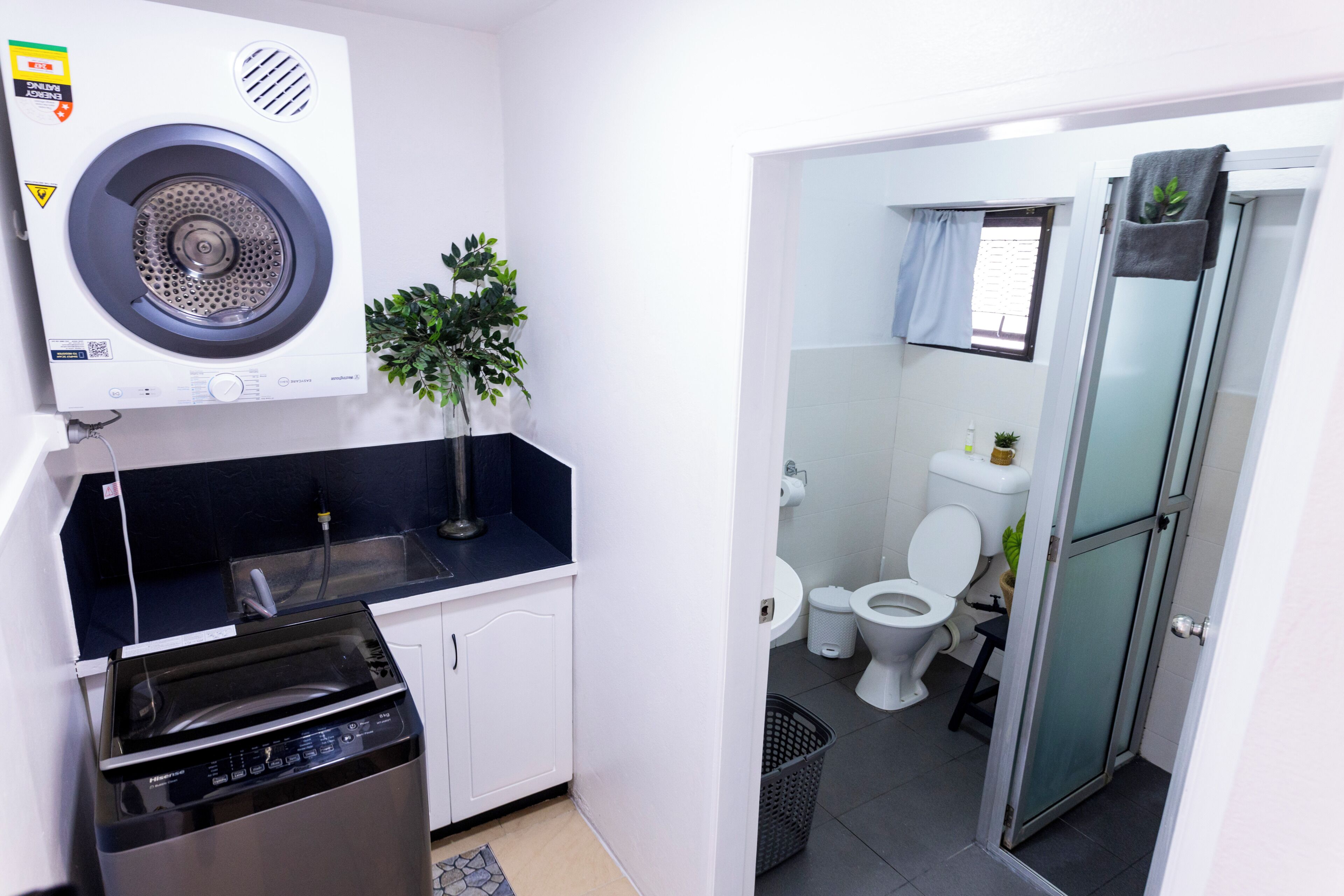 Shower, towels, soap, toilet paper