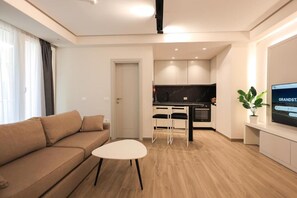 Habitación superior, balcón, vistas al patio | Zona de estar