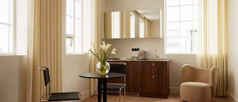 Fridge, stovetop, dishwasher, coffee/tea maker